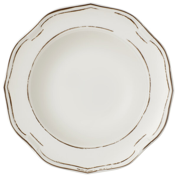 A white Villeroy & Boch porcelain deep plate with a white and brown rim.