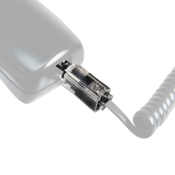 A black and clear Softalk phone cord detangler attached to a white phone cord.