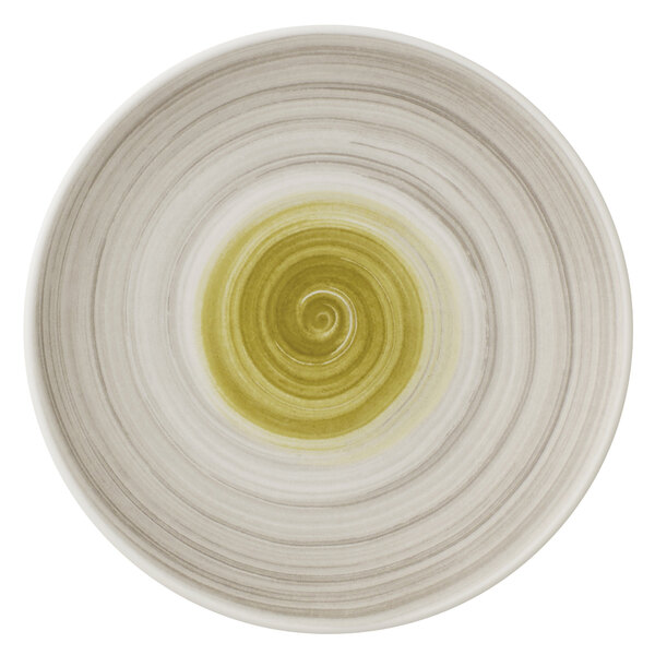 A Villeroy & Boch white porcelain coupe plate with a green swirl design.