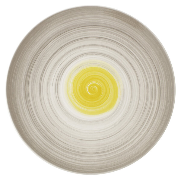 A white Villeroy & Boch flat porcelain plate with a yellow date flower swirl design.