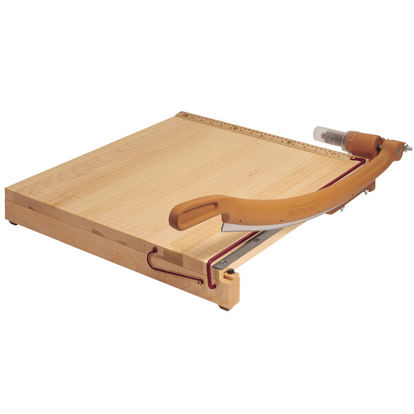 A Swingline ClassicCut Ingento paper trimmer with a wooden cutting board and handle.