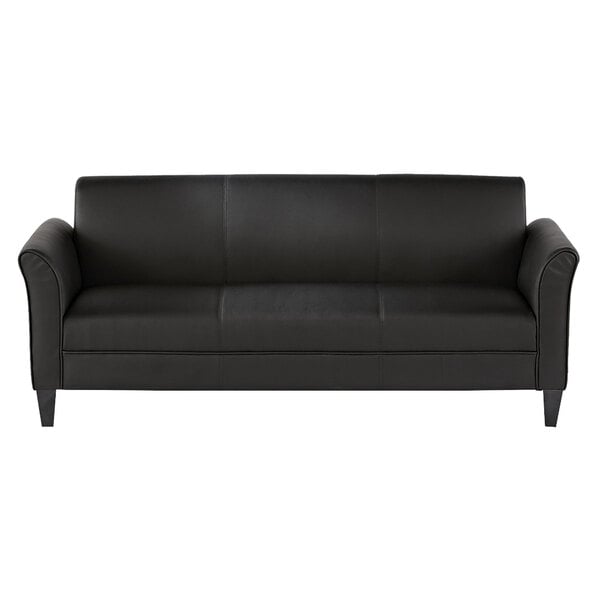 A black Alera leather sofa with wooden legs.