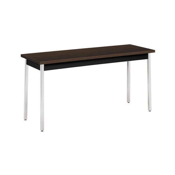 A brown and black HON utility table with metal legs.