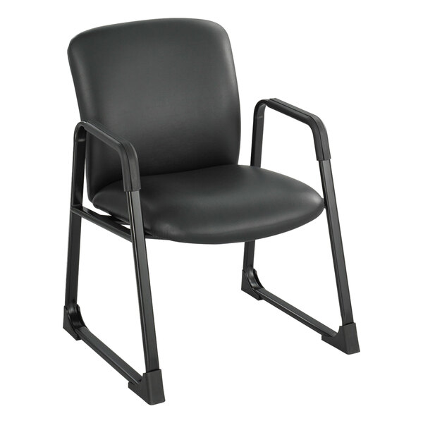 A Safco Uber big and tall black vinyl guest chair with a black frame and arms.