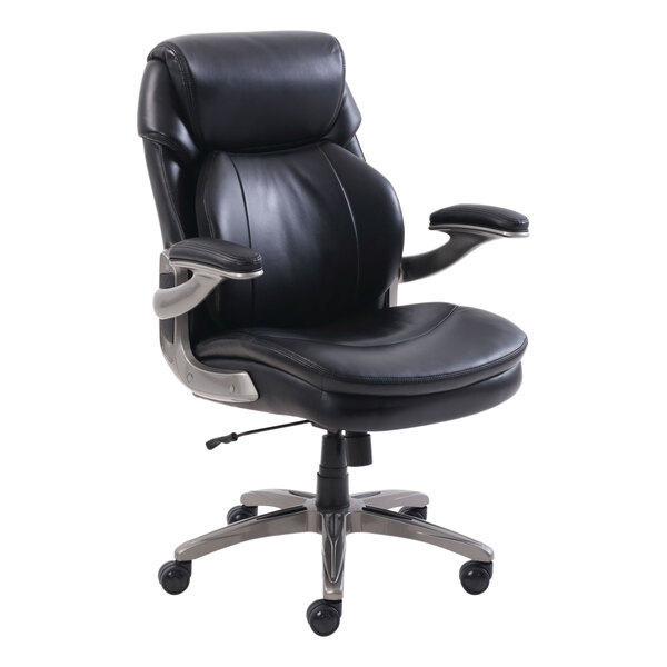 A black SertaPedic Cosset office chair with chrome legs and arms on wheels.