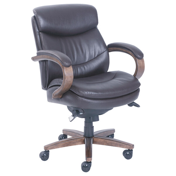 A brown leather La-Z-Boy office chair with wooden legs.