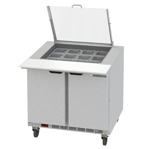 A Beverage-Air stainless steel refrigerated sandwich prep table with two doors and a mega top.