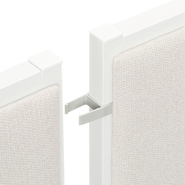 Gray Hon Basyx Verse connecting hardware with a hole in a white fabric screen.