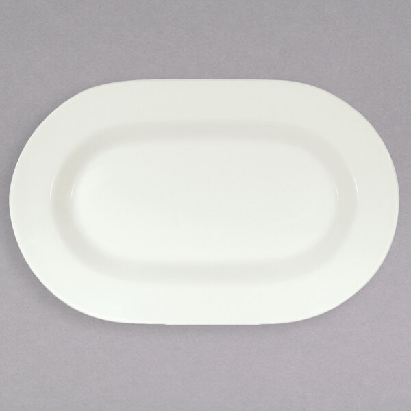 A white oval Schonwald porcelain platter with a small rim.