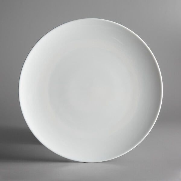 A white Schonwald Allure coupe plate with a white rim on a gray background.