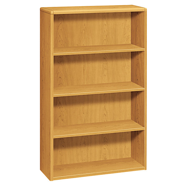 A wooden HON bookcase with four shelves.