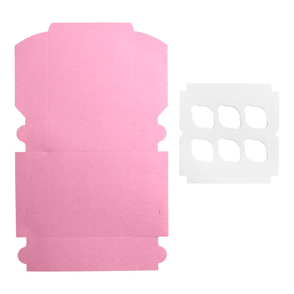 A flat pink cupcake or muffin box with a separate white reversible insert featuring six slots.