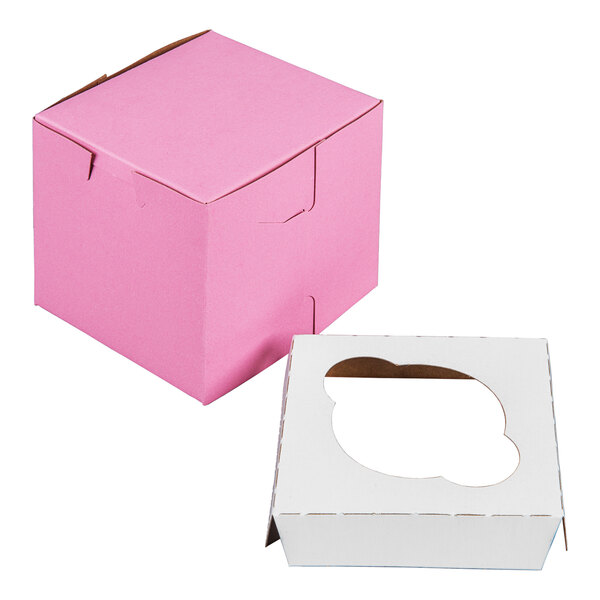A pink cupcake or muffin box with a separate white insert featuring a single slot.