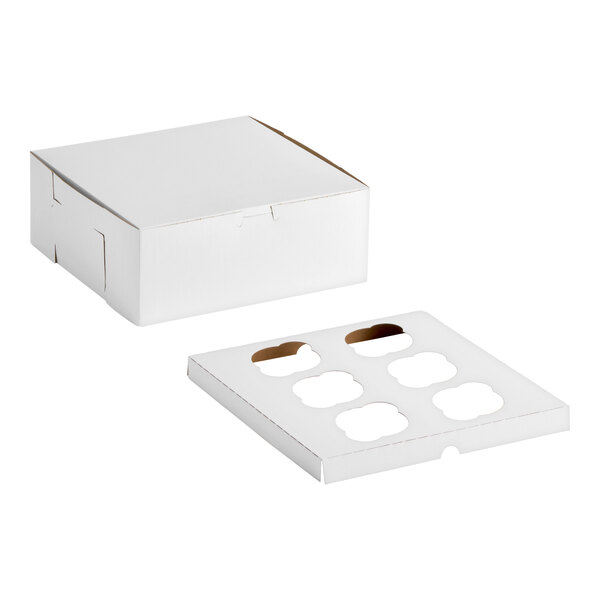 A white cardboard cupcake or muffin box with a separate reversible insert featuring six slots.