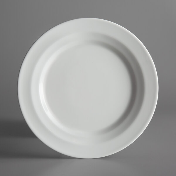 A Schonwald Allure bone white porcelain plate with a white rim on a gray background.