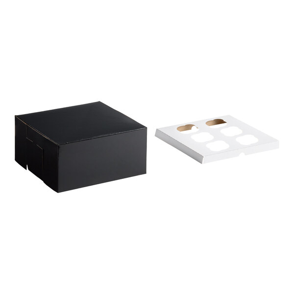 A black cupcake or muffin box with a separate white reversible insert featuring six slots.