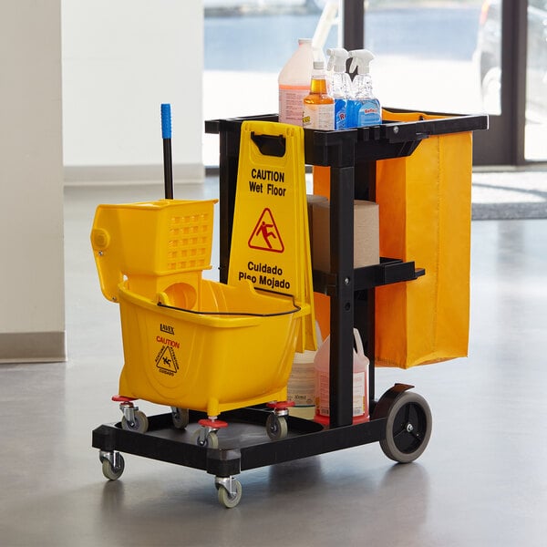 Lavex Black Cleaning Cart / Janitor Cart with 3 Shelves, Large Bottom Shelf, and Yellow Vinyl Bag