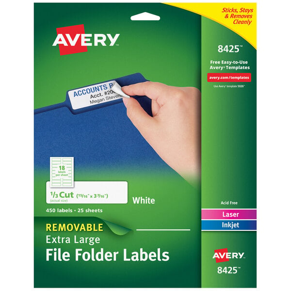 A hand holding a white piece of paper with an Avery file label on it.