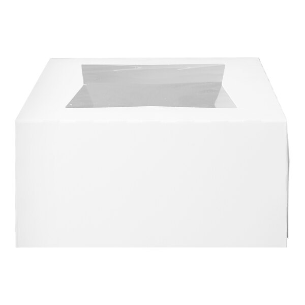 A white cupcake or muffin box with a clear window on top and a reversible insert for holding four items.