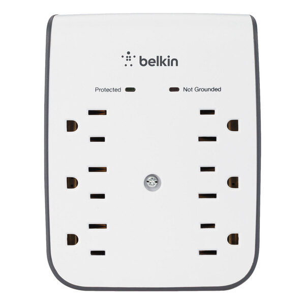 A white Belkin surge protector with 6 outlets and 2 USB ports.