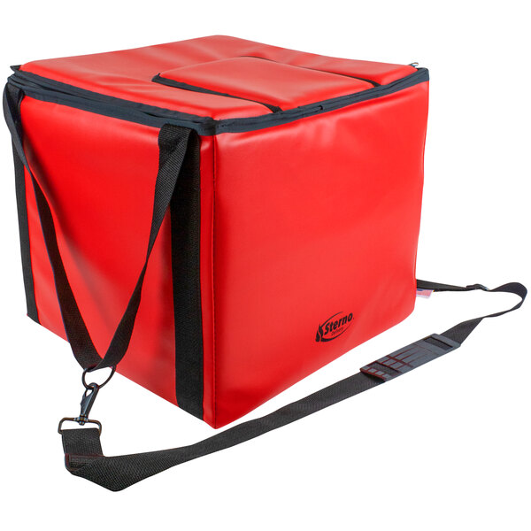 A red Sterno insulated food carrier bag with black straps.