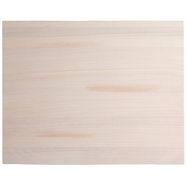 A white rectangular wood board with a live edge and wood surface.