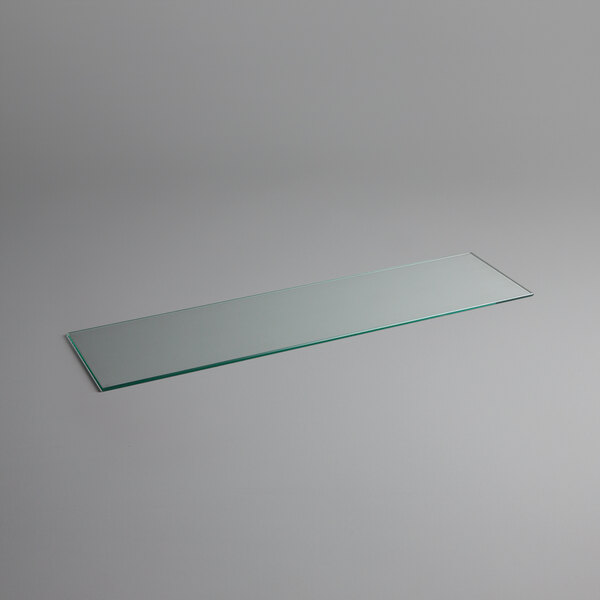 A rectangular glass panel with a long edge.