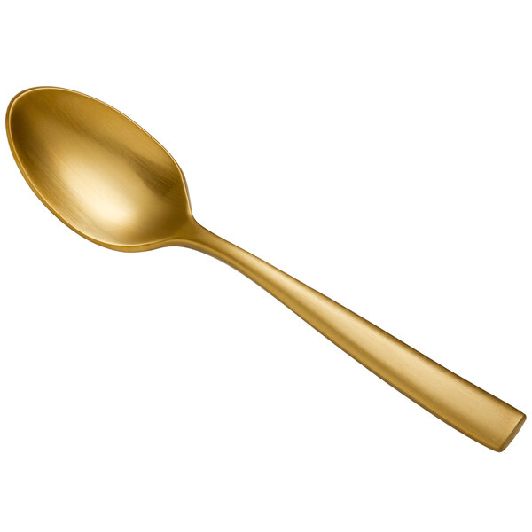 A close-up of a Bon Chef matte gold stainless steel demitasse spoon with a long handle.