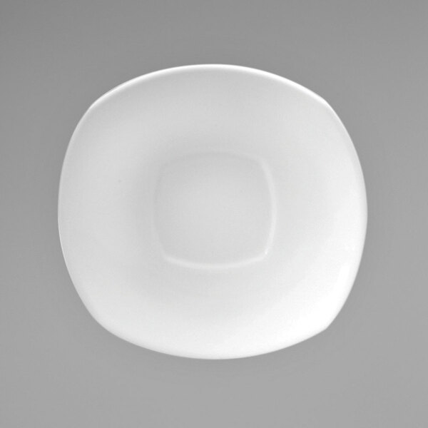 A white porcelain coupe saucer with a square center.