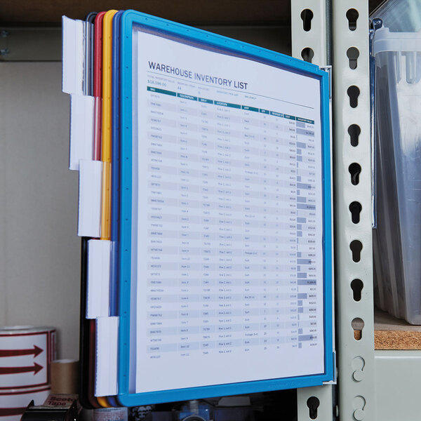 A Durable VARIO 5 panel wall reference system with assorted borders holding documents.