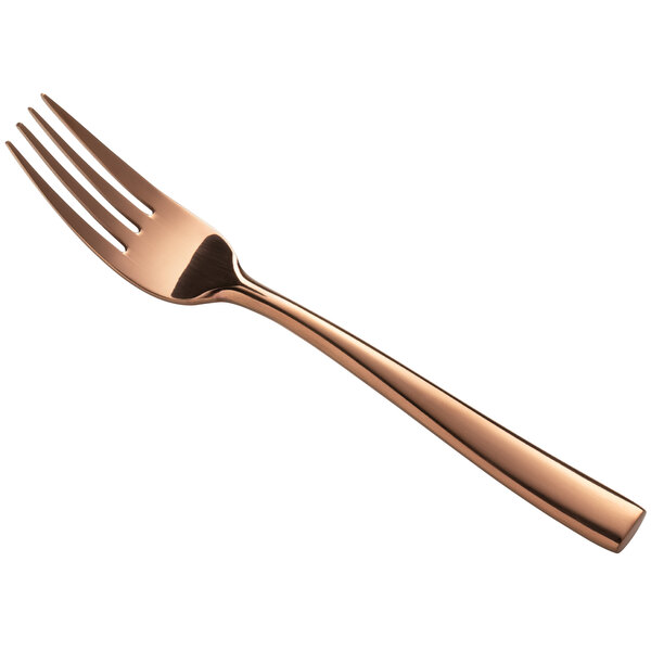 A close-up of a Bon Chef rose gold stainless steel salad fork.