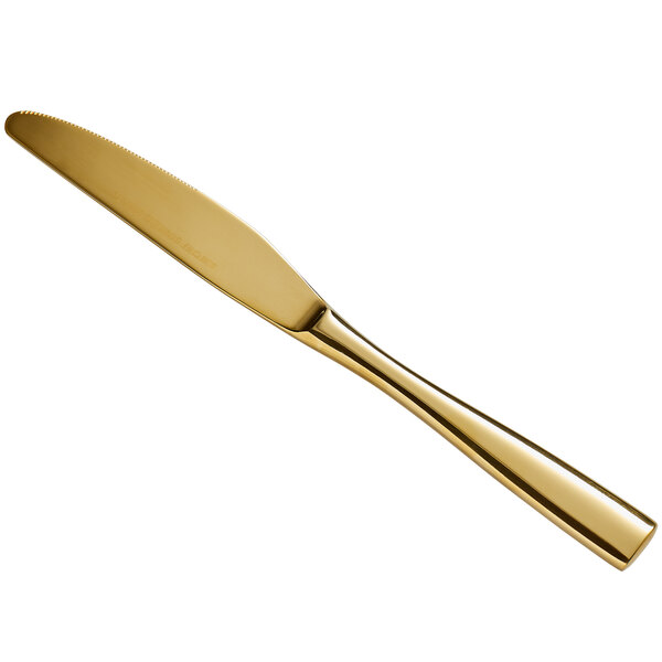 A close up of a Bon Chef gold stainless steel dinner knife.