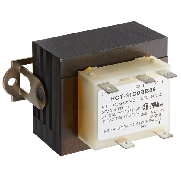 A close-up of a small black electronic transformer.