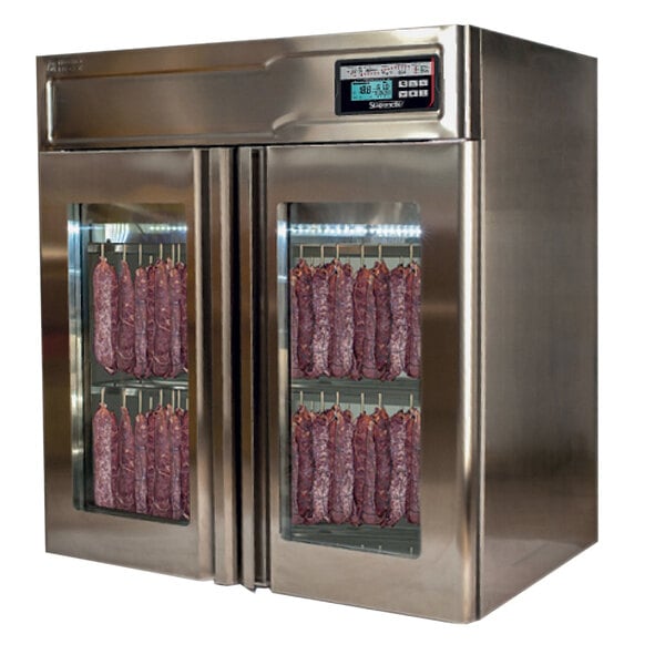 A Stagionello stainless steel meat curing cabinet with two glass doors and meat on racks inside.