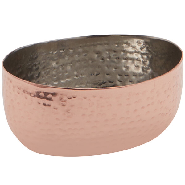 An American Metalcraft stainless steel sauce cup with a hammered copper finish.