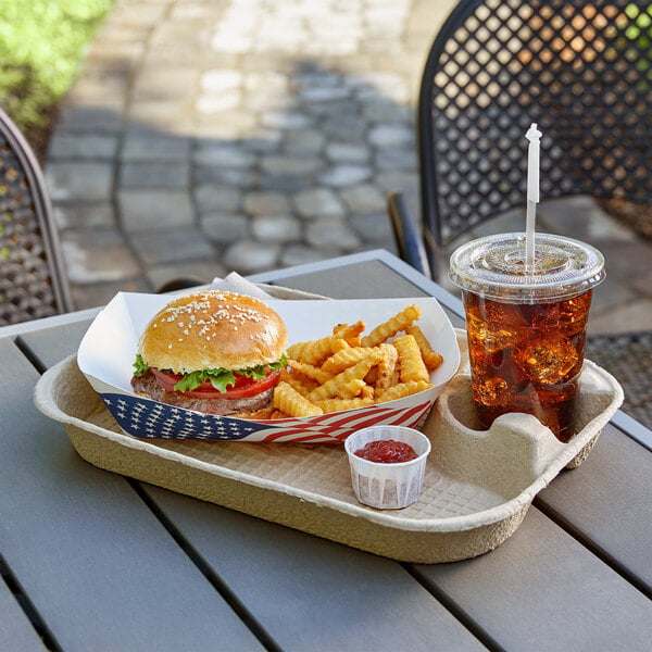A tray with a hamburger, fries, and a drink on it.