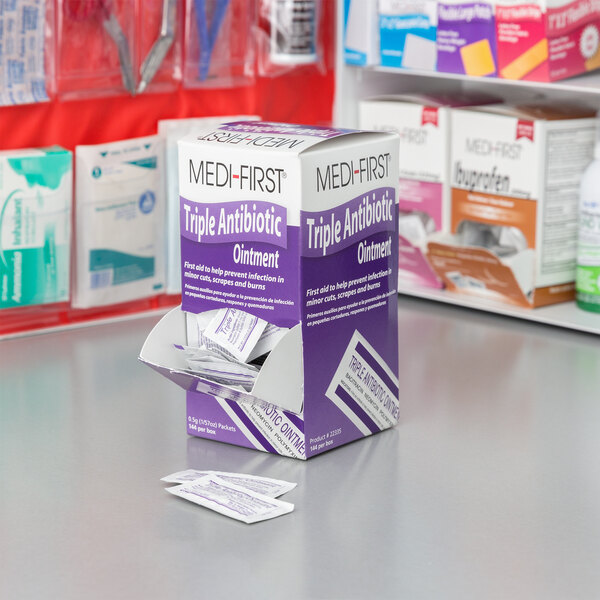 A box of Medi-First Antibiotic Cream packets.