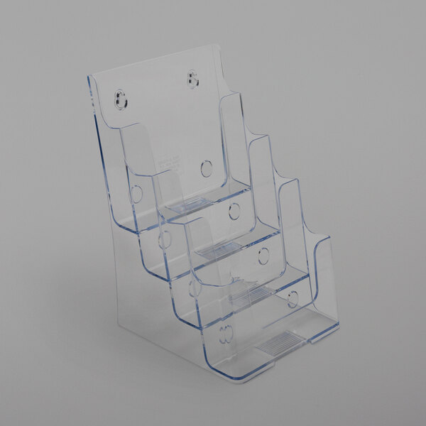 A clear plastic Deflecto literature holder with four compartments.
