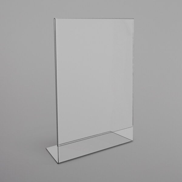 A clear plastic sign holder with a white background.