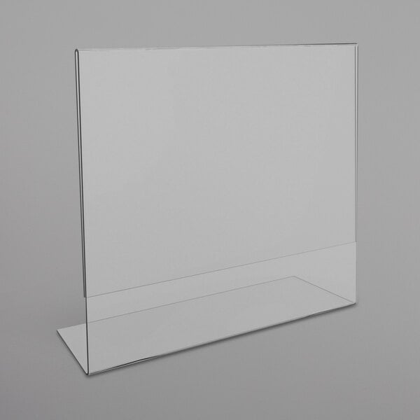 A clear plastic Deflecto landscape sign holder on a white surface.