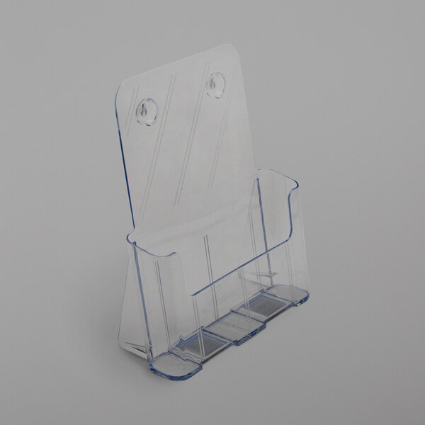 A clear plastic Deflecto magazine holder with holes.