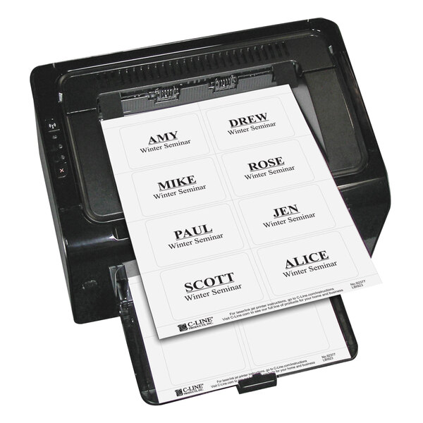 A printer with several white C-Line Products name cards in a paper tray.