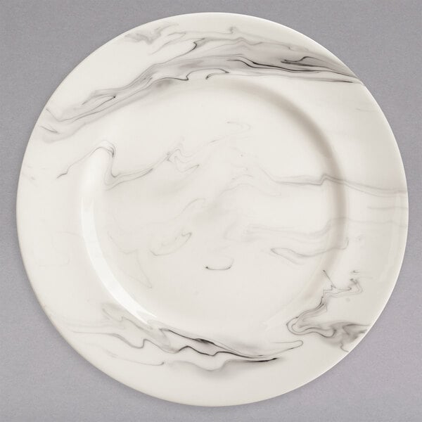 A white porcelain plate with black and white swirls.