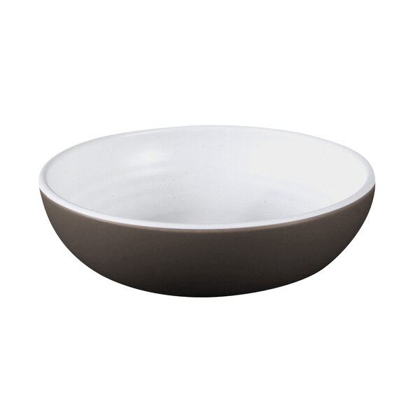 A speckled white melamine bowl with a chocolate brown rim.