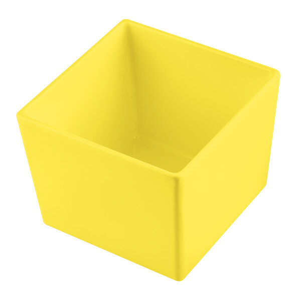 A yellow Tablecraft Simple Solutions cast aluminum bowl with straight sides.