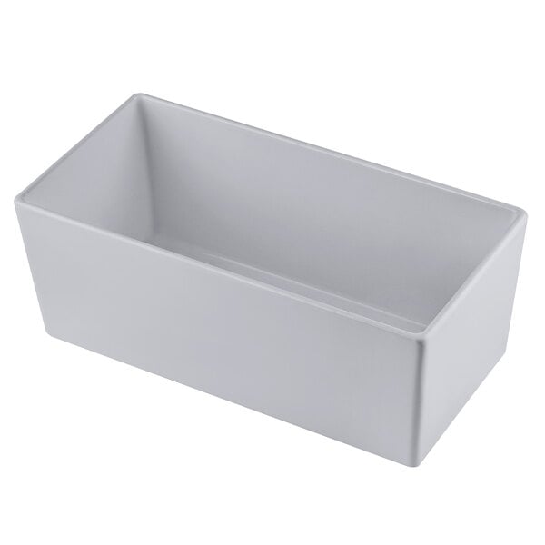 A white rectangular Tablecraft Simple Solutions cast aluminum bowl.