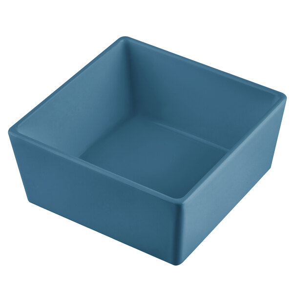 A Tablecraft pigeon blue square bowl with straight sides.