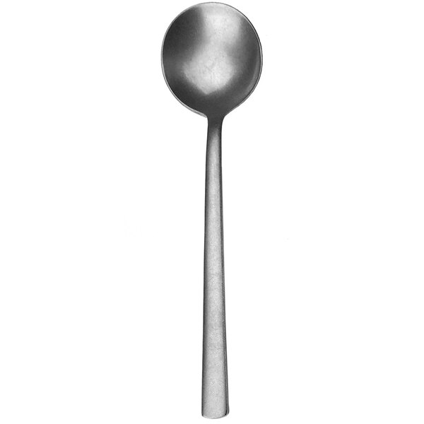 A close-up of a Walco stainless steel bouillon spoon with a fieldstone finish on the handle.