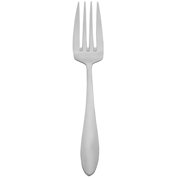 A silver Walco European table fork with a white background.