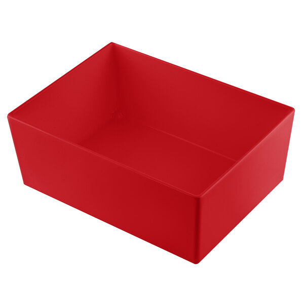 A red rectangular cast aluminum bowl with straight sides.